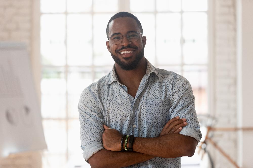 man in dress shirt smiling | dentist oakbrook terrace il