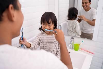 young child brushing teeth | airway dentist near me