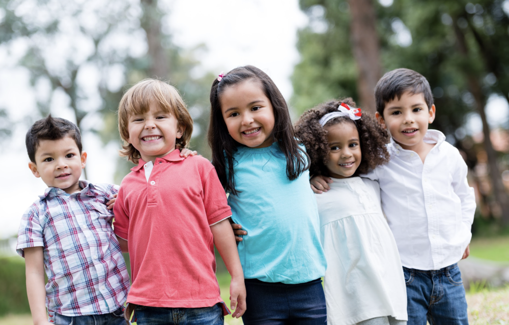 group of five kids outside | the airway dentist