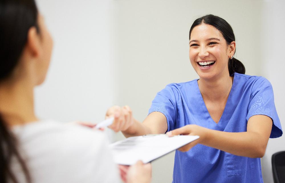 dental office manager smiling | general dentist oakbrook terrace il