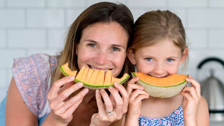 woman and daughter eating | airway dentist near me